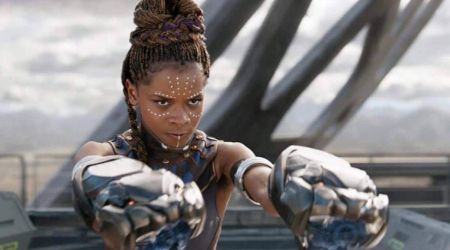 Shuri aiming at Killmonger with her weapon